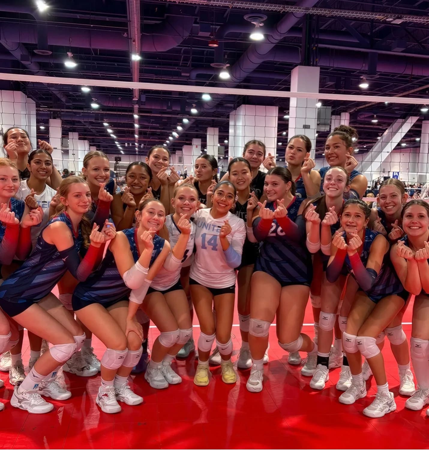 Volleyball athletes competing at a showcase event